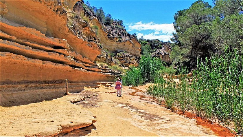 Walking along jagged sand rocks - Van Dam Estates