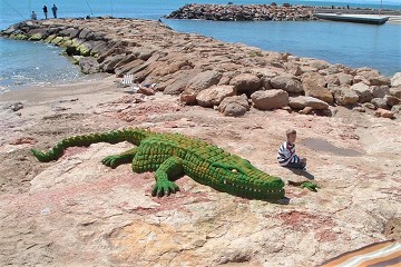 Arte de arena en las costas - Van Dam Estates